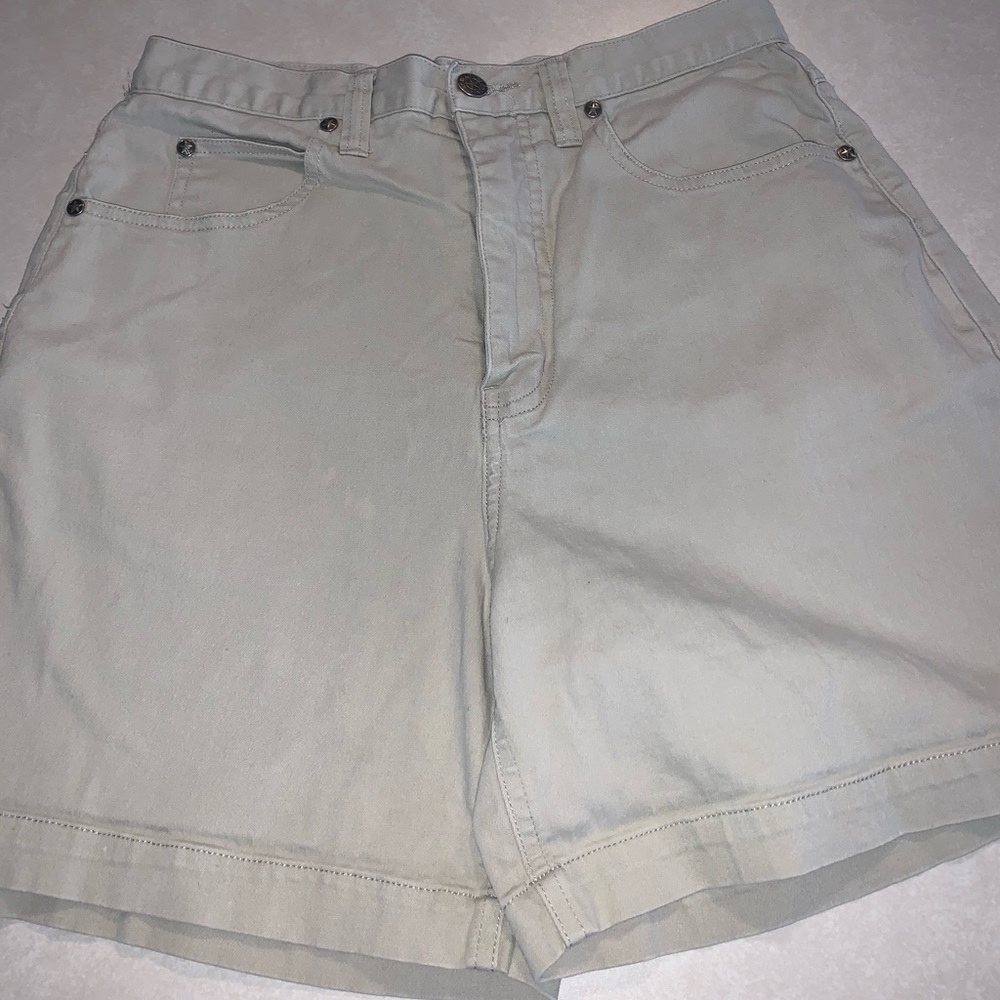 Creme colored jean shorts, button and zip up